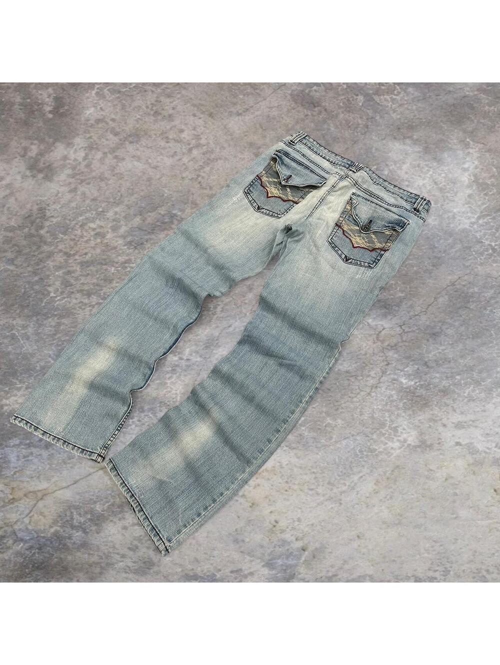Blue and white embroidered straight leg jeans with a relaxed fit #grunge